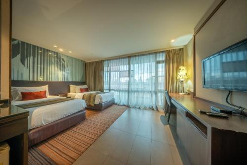 Katil atau katil-katil dalam bilik di M2 de Bangkok Hotel