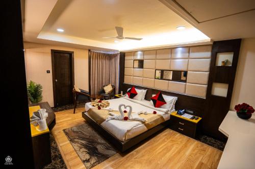 a bedroom with a bed with ducks on it at The Crystal Park in Kishangarh