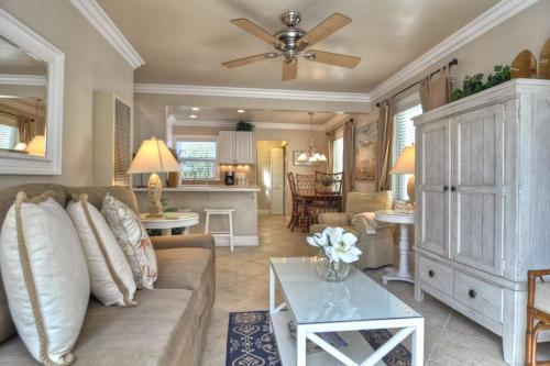 a living room with a couch and a ceiling fan at San Clemente - Monterey C in San Clemente