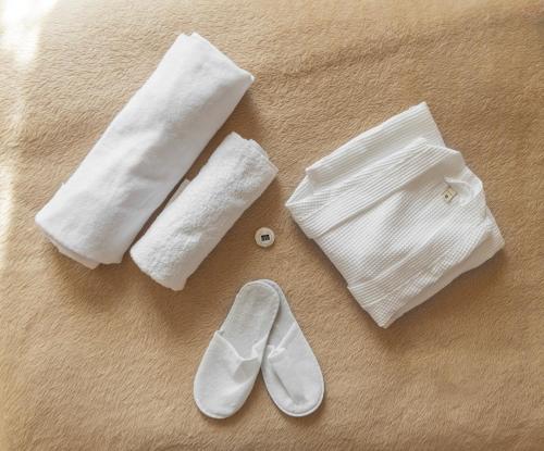 a pair of white socks and a pair of shoes at Green House -მწვანე სახლი in Tsalka