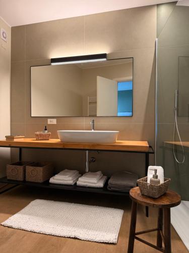 a bathroom with a sink and a mirror at Villa Prince Garda in Salò
