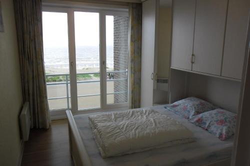 Een bed of bedden in een kamer bij Residence Scorpio