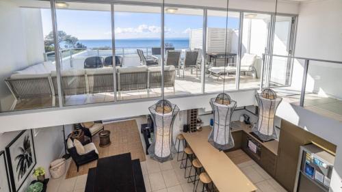 a view from the top of a building with a balcony at The Lookout in Woorim