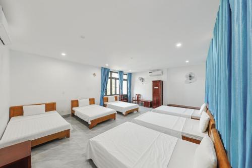 a hospital room with two beds at 359 Beach Hotel in Phú Xá