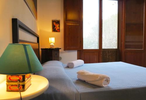 Кровать или кровати в номере Lisola Residence