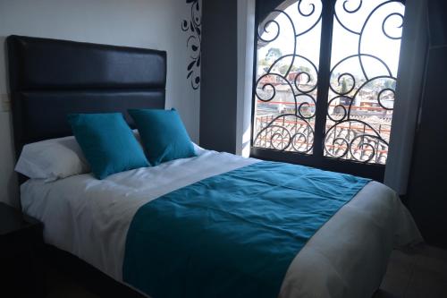 Andrea´s Hotel Boutiqueにあるベッド