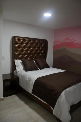 Andrea´s Hotel Boutiqueにあるベッド