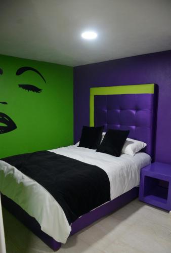 Andrea´s Hotel Boutiqueにあるベッド