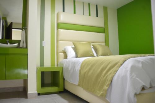 Andrea´s Hotel Boutiqueにあるベッド