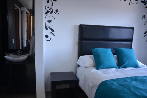 Andrea´s Hotel Boutiqueにあるベッド