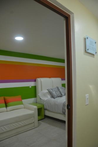 Andrea´s Hotel Boutiqueにあるベッド