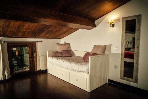 Katil atau katil-katil dalam bilik di Apartamentos 1177