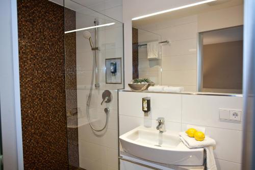 Koupelna v ubytování Hotel-Restaurant Arneggers Adler