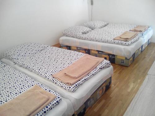 three mattresses stacked on top of each other in a room at Šťastná třináctka in Svoboda nad Úpou