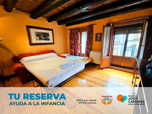 a bedroom with two beds and a window at Apartamentos Jaca Ciudadela 3000 in Jaca