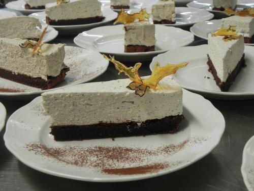 a piece of cake on a plate on a table at Casale l'Antico Carro in Cortona