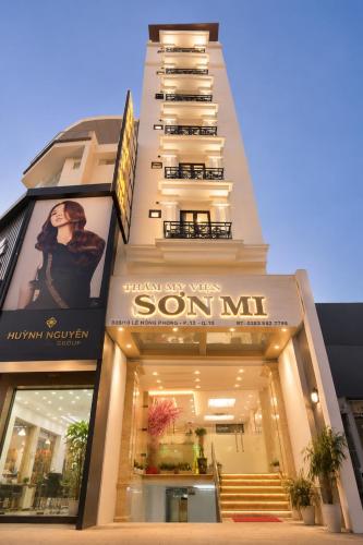 a store front of a building with a sign on it at Son Mi Hotel in Ho Chi Minh City
