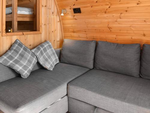 a couch sitting in a room in a cabin at Stainton-Uk1395 in Corney