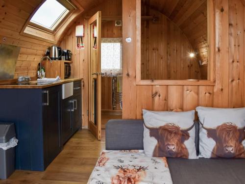 a bedroom with a bed with cow heads on it at Withy Bottom-Uk1393 in Corney