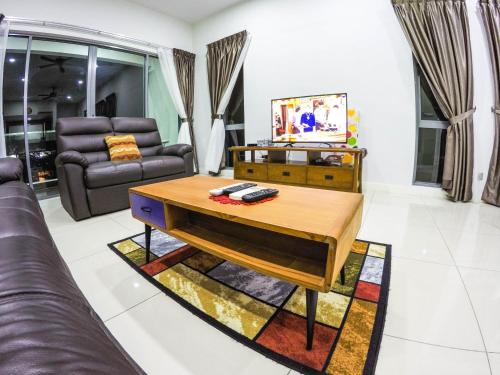 a living room with a coffee table and a couch at Luxury Condominium at Loft Imago in Kota Kinabalu