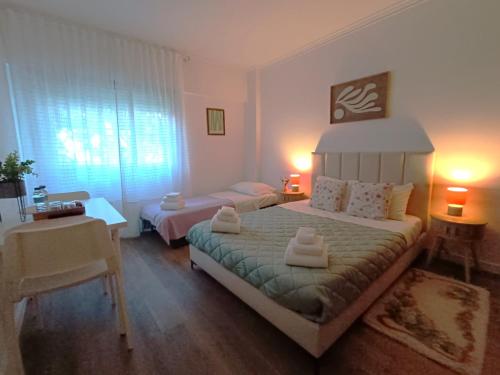 a bedroom with two beds in a room at Comfort Rooms Near Lisbon Airport - Carlotta Living in Lisbon