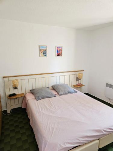 Appartement 1 chambre, piscine, terrasse entre port et plage