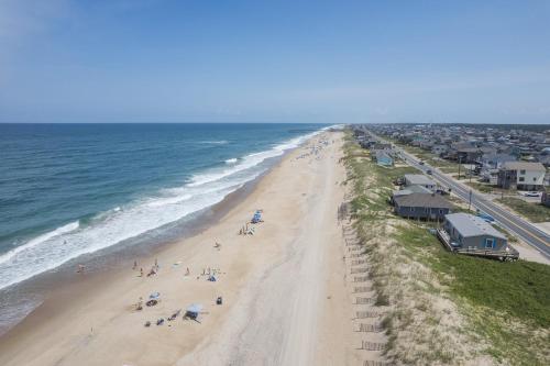 an overhead view of a beach with people on it at 5010 - Once Upon A Tide in Kill Devil Hills