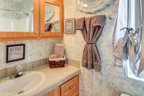 a bathroom with a sink and a shower at Pool + Dock Access! Boater’s Base in Lake Placid in Lake Placid