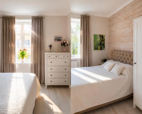 a white bedroom with two beds and a dresser at Stylish air-conditioned Klaipeda Flat, Near Dane River in Klaipėda