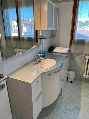 a bathroom with a sink and a mirror at La Culla del Mugello in Scarperia
