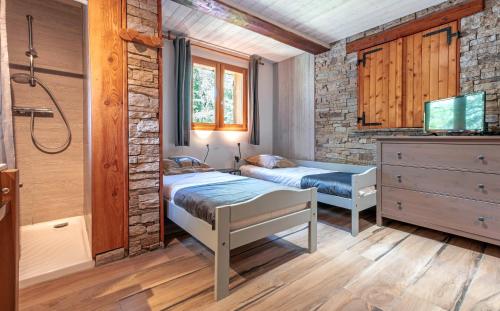 Appartement dans chalet 5 pièces, 14 pers, 4 ch, WiFi, jardin privé