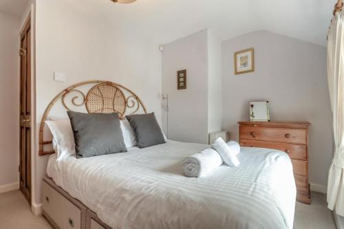 a bedroom with a large white bed with pillows at 2 Bed in Richards Castle oc-r45225 in Lane to Richards Castle