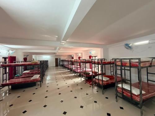 a room with a bunch of bunk beds at ABS Residency, Wayanad- Sulthan Bathery in Sultan Bathery