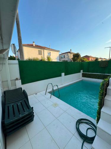 Casa cidade e piscina