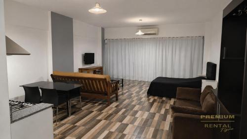 a living room with a couch and a table at Rental Tigre in Tigre