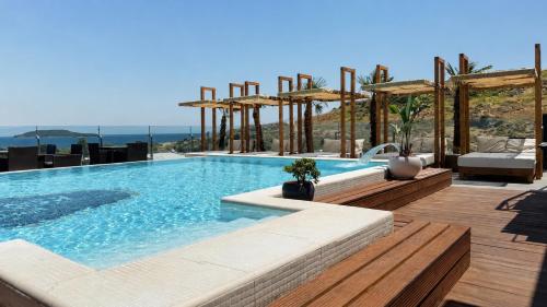a swimming pool on top of a house at Ferush Boutique Hotel in Urla