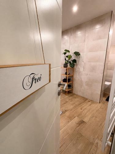 a door with the word first written on it next to a room at Haus Johannes in Braubach