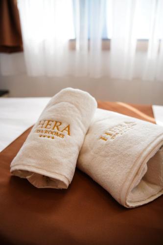a towel on a table with the words new nationals on it at Vila Hera Spa in Vrbas