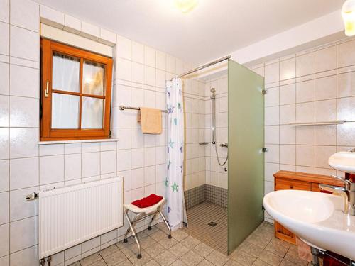 a bathroom with a shower and a sink at Glashof in Sankt Georgen im Schwarzwald