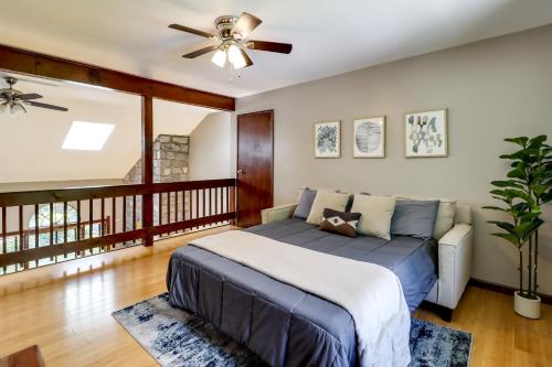 a bedroom with a bed and a ceiling fan at Lake Access & Private Hot Tub at Poconos Home! in White Haven