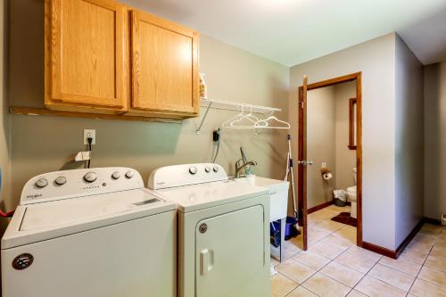 a kitchen with a stove and a sink at Lake Access & Private Hot Tub at Poconos Home! in White Haven