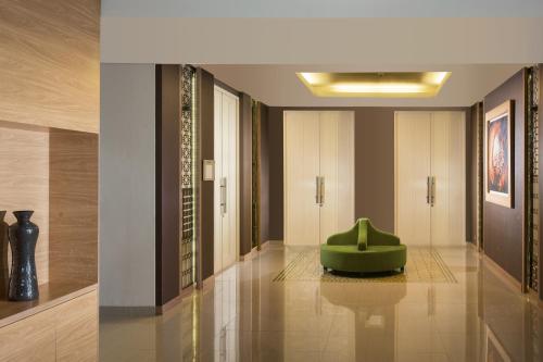 Χώρος καθιστικού στο KHAS Tugu Hotel Yogyakarta