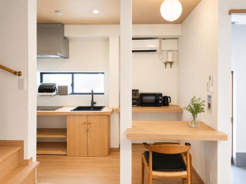 Direct Train to Namba & Shinsaibashi kyoto-style Machiya and Japanese Garden