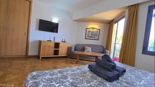 Puerto Marina Studio 2 with seasonal pool and sea views Just steps form Puerto Marina and the beach by NAMASTE ELITE