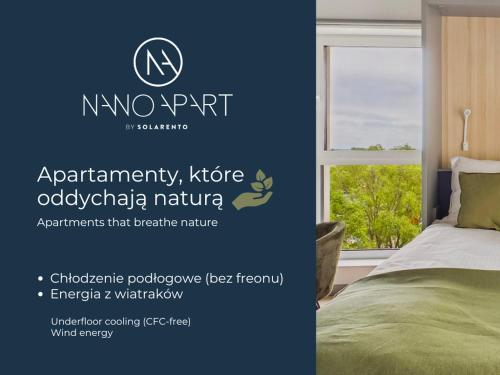a sign for a nno appartartment in a bedroom at NanoApart by Solarento in Warsaw