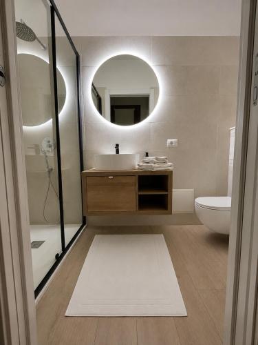 a bathroom with a sink and a mirror at Casa Tanca Marchese in Marrùbiu