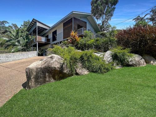 a house with some rocks in front of it at Debs Shed in Arcadia