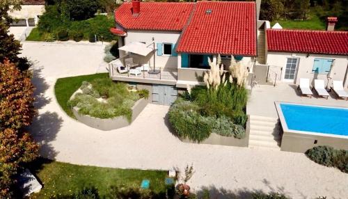 an aerial view of a house with a red roof at Casa Cavi Istria in Oprtalj