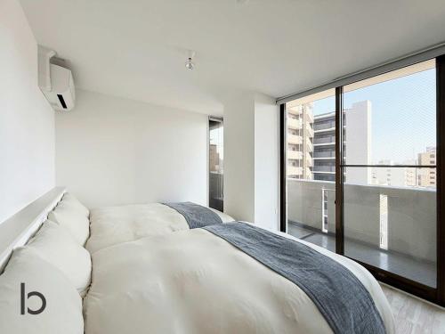 b hotel Lafort honkawa - New 2BR Apt 5 min Walk to Peace Park Sleeps 6
