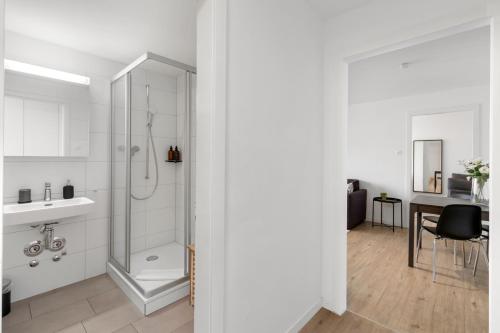 a bathroom with a shower and a sink at AirHosted - Lucerne City Centre in Lucerne